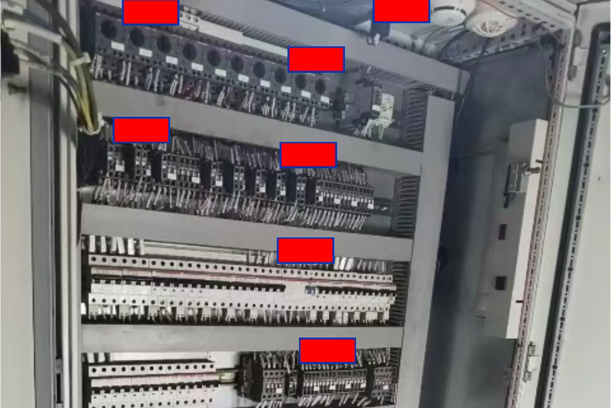 Electrical cabinet showing candidate positions for passive heat-activated fire-suppression components