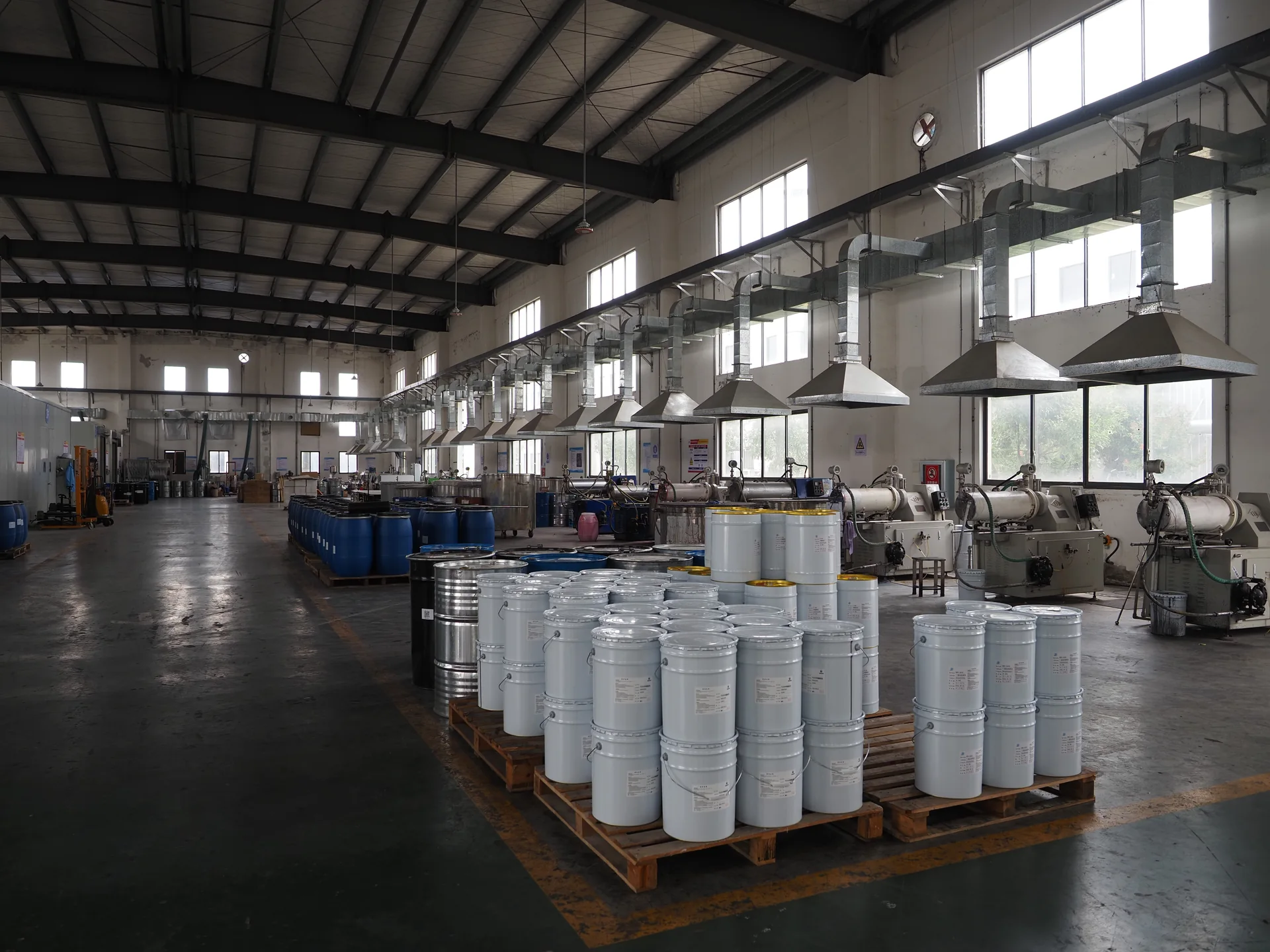 Interior of the DSAN workshop with equipment and material containers