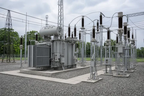 Outdoor electrical insulators illustrating a water-repellent, pollution-flashover coating application